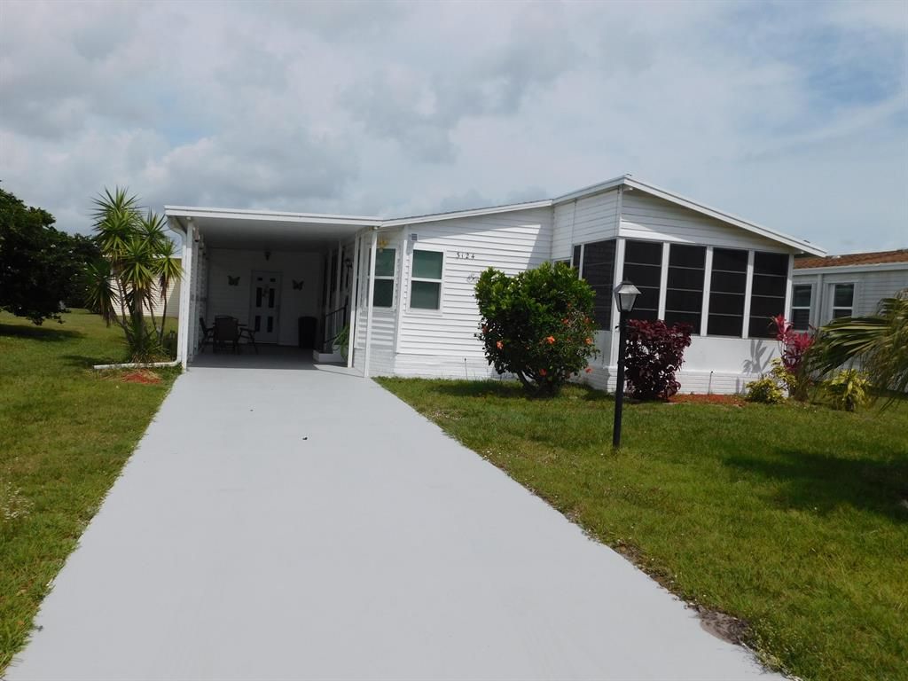 Photo of 3124 Crabwood Lane Ln, Port Saint Lucie, FL 34952 (MLS # R10769375)