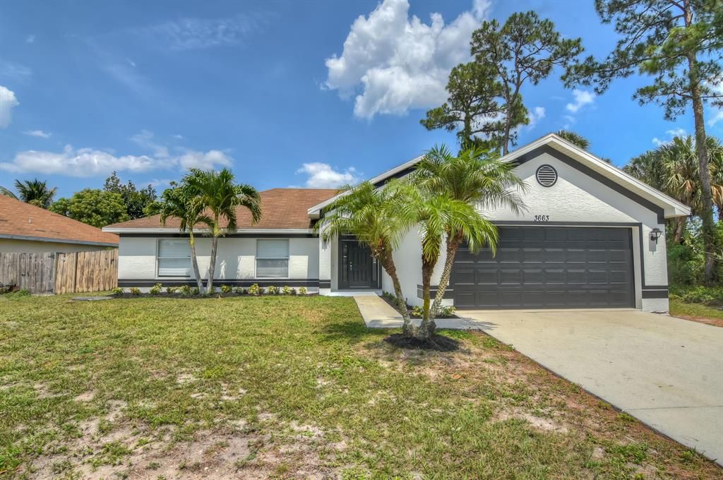 Photo of 3663 SW Ballweg Street, Port Saint Lucie, FL 34953 (MLS # R10801572)