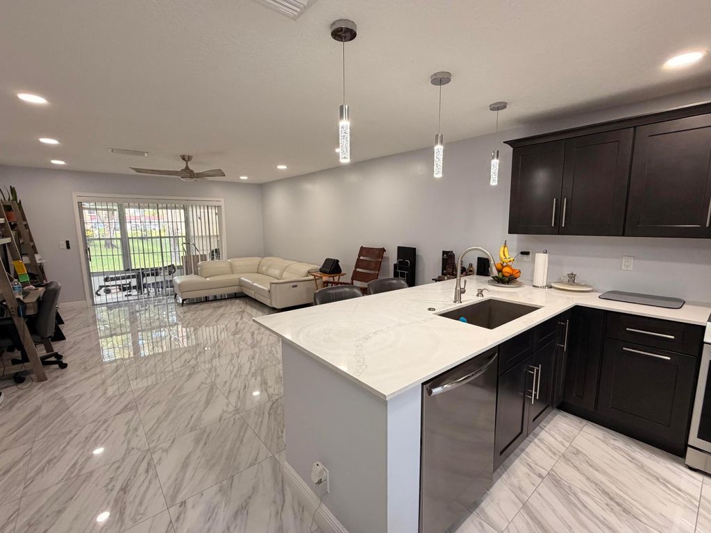 Photo of 201 Lake Dora Drive, West Palm Beach, FL 33411 (MLS # B26027392)