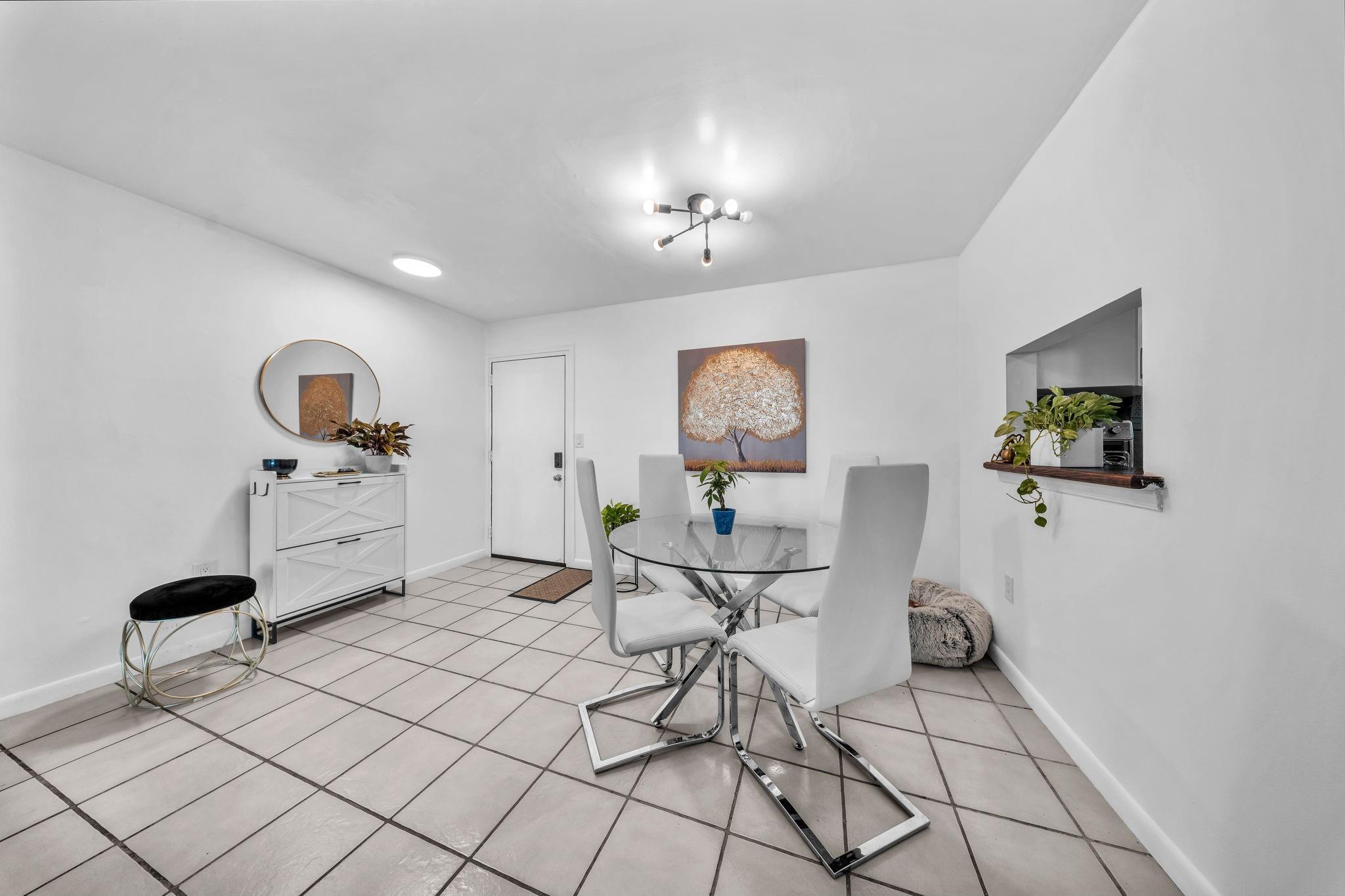 Beautifully remodeled 3-bedroom, 2-bathroom corner unit located on the first floor in the heart of West Kendall. The best part, you can purchase this unit with as little as 3% down payment! This spacious unit features plenty of natural light throughout, updated kitchen and bathrooms, washer & dryer inside the unit, new AC (2025) new water heater (2024).Enjoy the privacy of a corner unit, convenient first floor access, prime location close to shopping, dinning and good schools. Perfect for primary resident or investment opportunity.