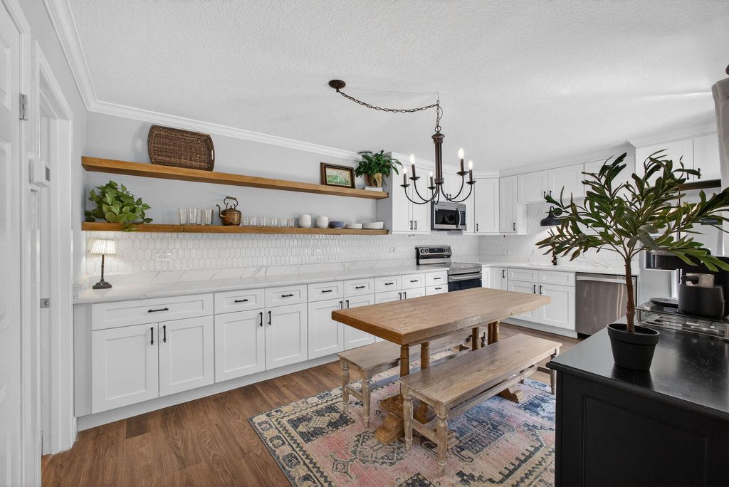 Photo of 711 7th Lane, Palm Beach Gardens, FL 33418 (MLS # B26005396)