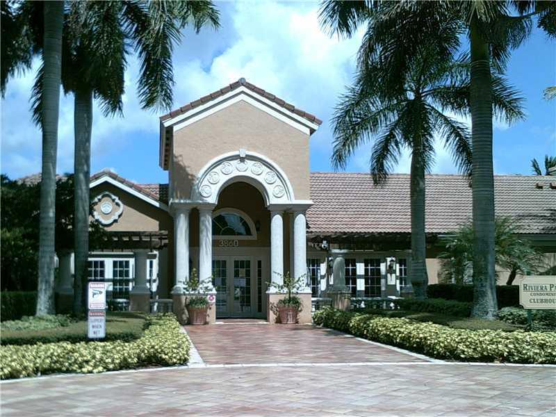 Beautiful, bright and airy 1st floor unit with a lake view. It features tiled floors, a separate dining area, an open attractive kitchen, a separate laundry room w/washer and dryer and porch. The large master bedroom includes a walk in closet and a private bathroom with dual access for guests. Riviera Palm is a gated community with a large clubhouse available for birthday parties and special events. It is centrally located in Coconut Creek, near major roads, the Promenade Plaza, schools, parks, malls, the casino, beautiful beaches, movie theatres, hospitals, etc. Don't miss it.
