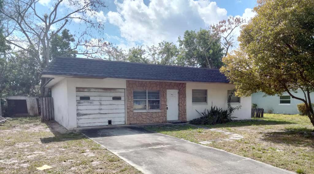 Photo of 1640 SE Arapaho Avenue, Stuart, FL 34994 (MLS # R10975392)