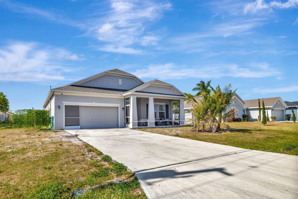 Photo of 899 SW Jaslo Avenue, Port Saint Lucie, FL 34953 (MLS # F10501946)