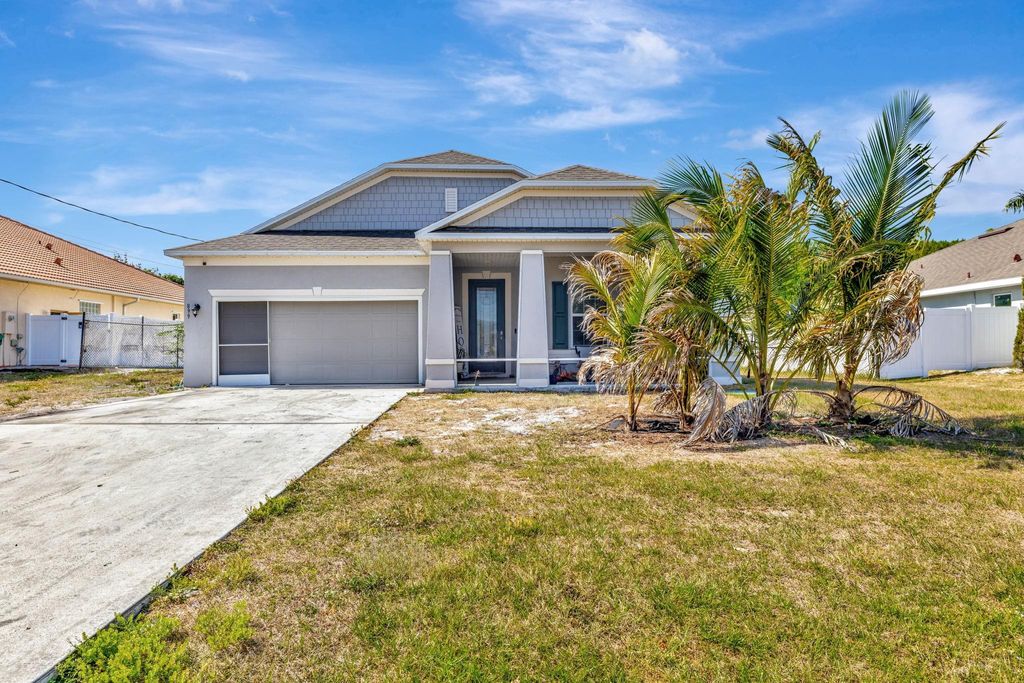 Photo of 899 SW Jaslo Avenue, Port Saint Lucie, FL 34953 (MLS # F10501946)