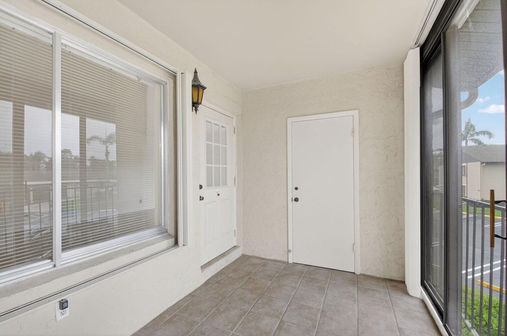 Photo of 416 Pine Glen Lane #D-2, Greenacres, FL 33463 (MLS # R11097123)
