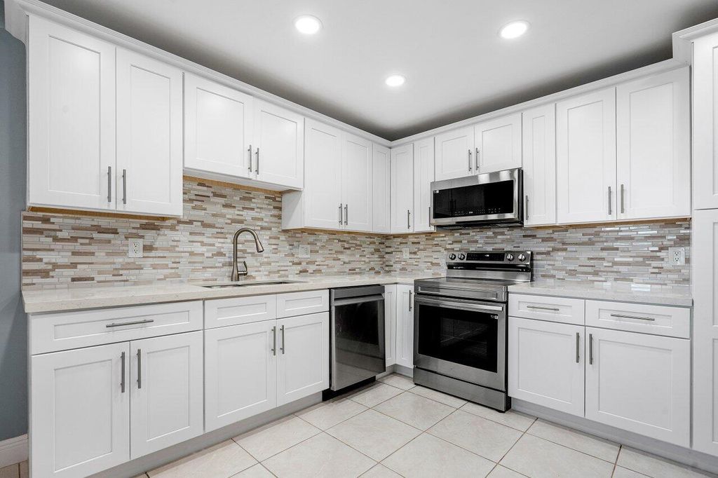 Photo of 1740 NW 19th Terrace #204, Delray Beach, FL 33445 (MLS # R11007705)