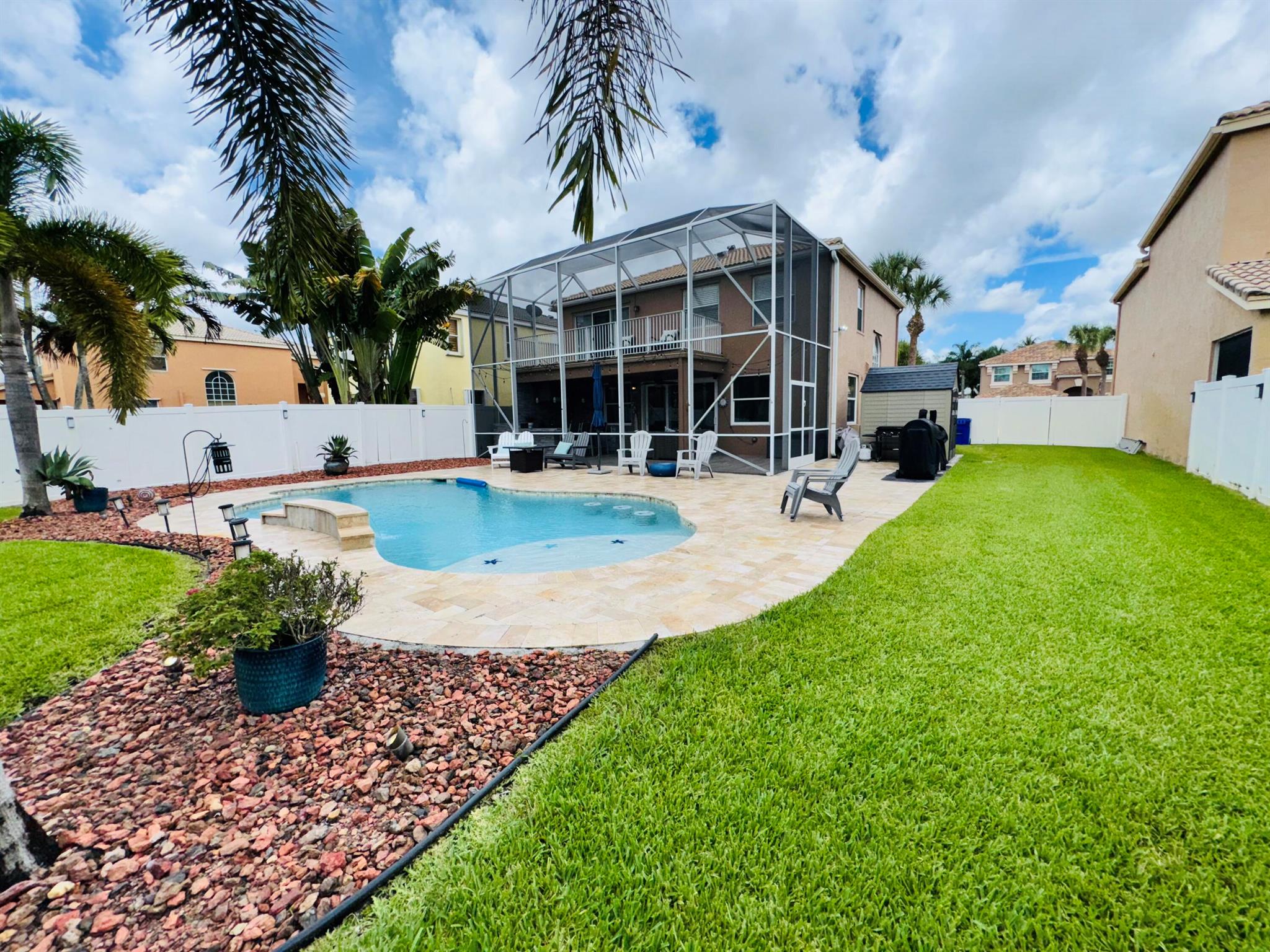 PARADISE FOUND!! BEAUTIFUL HOME, HOMEOWERS PRIDE. THIS GEM FEATURES 4 BEDROOMS, 2.5 BATHROOMS, BRIGHT OPEN FLOOR PLAN. SIT ON YOUR PRIVATE SCREENED BALCONY OFF OWNERS SUITE OVERLOOKING POOL. BOASTING UPDATED KITCHEN & BATHROOMS. RESORT BACKYARD FEATURING, OUTDOOR KITCHEN & BAR LUSHED LANDSCAPING, FENCED YARD & SCREEN PATIO. MADISON GREEN COMMUNITY AMENITIES INCLUDE: RESORT STYLE CLUBHOUSE: POOL, KIDDIE POOL, BASKETBALL & TENNIS COURTS, 18 HOLE GOLF COURSE, RESTAURANT & BAR, WALKING PATHS AND MUCH MORE.. A MUST SEE TO APPRECIATE.DON'T MISS THIS OPPORTUNITY. ALL SIZES APPROX. NOT GUARANTEED.