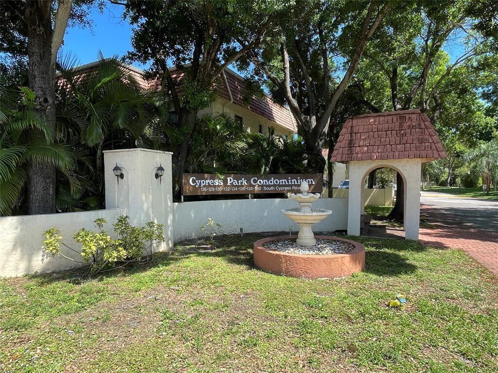 Renovated first floor corner unit with some canal view. Gorgeous 2 bed 2 bath condo with screen patio and just steps to pool and clubhouse area. One of the best locations in complex!. Renovated kitchen with quartz counter tops and custom cabinets with lighting. Stainless steel appliances. Equipped with Hurricane Impact Glass!! Beautiful wood flooring and renovated baths. No carpet! 10 min to beach. Water, Sewer and Trash included. Can be offered partially furnished or unfurnished. All Ages Ok. No Pets No trucks as per association. Walking distance to shops, grocery, dining and more. Easy access to 95 and approx. 5 min drive to Pompano Beach and fishing pier. Community pool, clubhouse, jacuzzi and tennis.