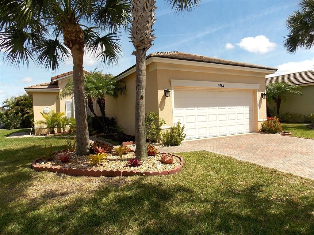 Photo of 9764 SW Eastbrook Circle, Port St Lucie, FL 34987 (MLS # R10878433)