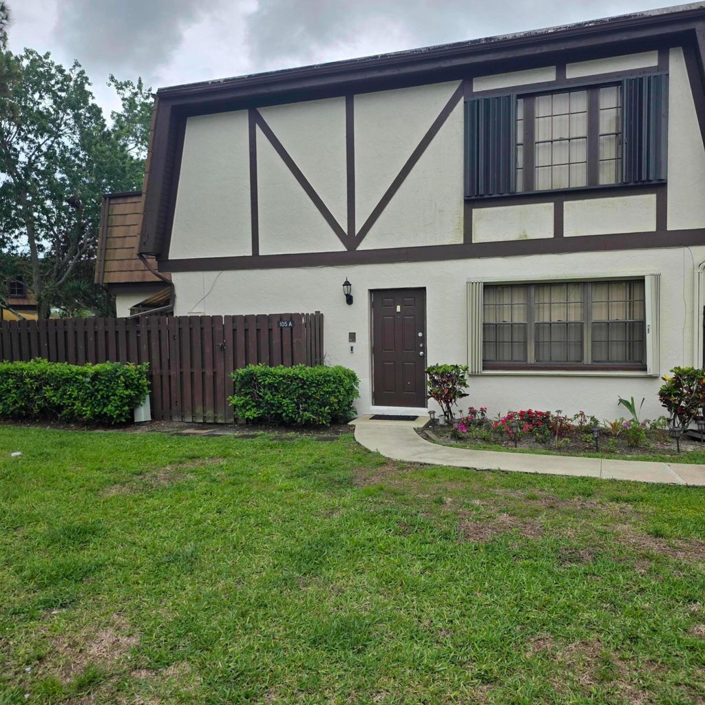 Photo of 105 Weybridge Circle #A, Royal Palm Beach, FL 33411 (MLS # B26013068)