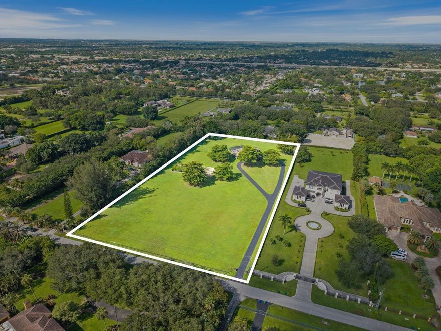 Seize one of the last remaining 5± acre estates in Sunshine Ranches, perfectly situated on prestigious Thoroughbred Lane. This private, fully fenced property offers endless potential—subdivide into two lots, build a custom compound, or design a single dream estate of over 20,000+ sq ft. The existing 4 BR / 4.5 BTH home features an updated primary suite, expansive game room with bar, oversized screened-in pool. Quiet, no-thru street location makes this one of the most coveted addresses in all of Southwest Ranches. A rare opportunity for equestrian enthusiasts, developers, or those seeking the ultimate in privacy and luxury living.