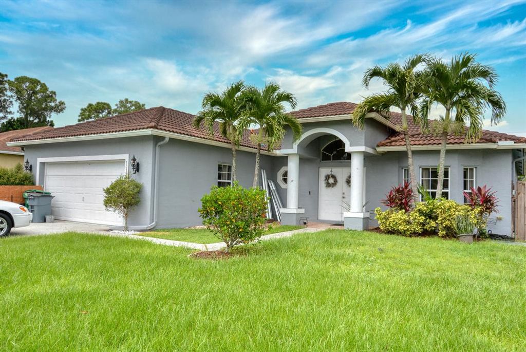 Photo of 3032 SW Savona Boulevard, Port Saint Lucie, FL 34953 (MLS # R10740462)