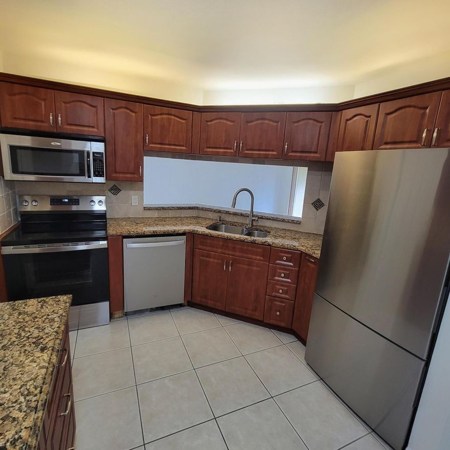DESIRABLE LOCATION THIS BEAUTIFULLY  RENOVATED CLEAN 1ST FLOOR CONDO IS FRESHLY PAINTED MOVE IN READY & OFFERS A PARTIAL LAKE VIEW VAULTED CEILINGS (NO POPCORN) DECORATIVE LIGHTING TILE & LAMINATE FLOORING UPDATED OPEN KITCHEN WITH GRANITE COUNERTOPS PASS THROUGH WITH COUNTER BAR WOOD CABINETS NEW SS APPLIANCES SPACIOUS BEDROOMS WITH UPDATED BATHS WALK IN CLOSET COVERED SCREENED PATIO FULL SIZE WASHER DRYER ATTTACHED 1 CAR GARAGE WITH PAINTED FLOOR AMENITIES INCLUDE HEATED POOL WITH SHADE COVERED PICNIC AREA PICKLEBALL/TENNIS COURTS 2 LEVEL CLUBHOUSE WITH LOFT & GAMEROOM FITNESS ROOM & SAUNAS OK TO LEASE IMMEDIATELY GATED ALL AGE PET FRIENDLY COMMUNITY LOCATED IN CENTRAL BOYNTON BEACH CLOSE TO SCHOOLS SHOPPING MAJOR HWYS & TRI-RAIL A MUST SEE! SCHEDULE A SHOWING TODAY BRING ALL OFFERS!