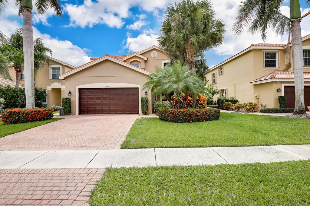 Photo of 10894 Bitternut Hickory Lane, Boynton Beach, FL 33437 (MLS # B26006888)