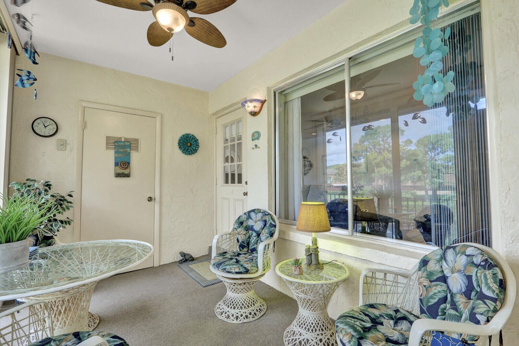 Photo of 323 KNOTTY PINE Circle #A-2, Greenacres, FL 33463 (MLS # B26080282)