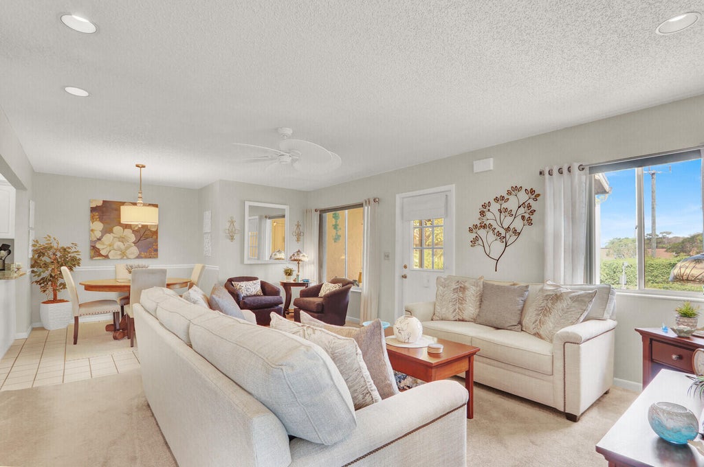 Photo of 323 KNOTTY PINE Circle #A-2, Greenacres, FL 33463 (MLS # B26080282)