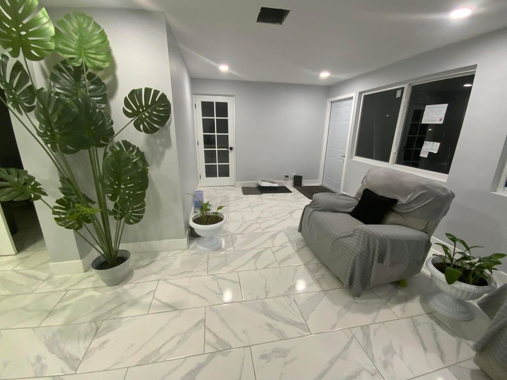 Photo of 5730 E Fernley Drive E #12, West Palm Beach, FL 33415 (MLS # R11161073)