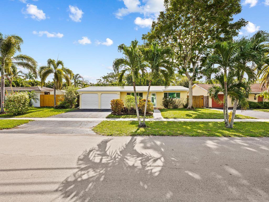 Photo of 1320 SW 55th Avenue, Plantation, FL 33317 (MLS # B26015540)