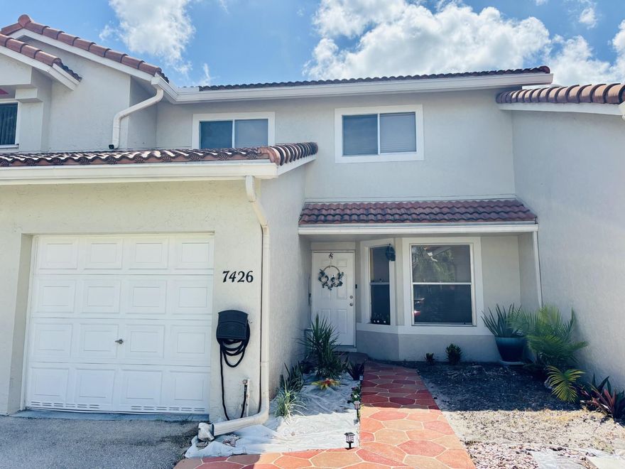 **SELLER IS WILLING TO CONTRIBUTE TOWARD CLOSING COST, DON'T MISS THIS EXCELENTE OPPORTUNITY FOR INVESTORS OR OWNER OCCUPANTS** property is currently rented for $3,200/month  through June 30,2026, lease maybe renewed or terminated at expiration. This spacious townhome feels like a single family home! Outstanding features includes master bedroom, master bathroom and  guest half bath on the first floor, Upstairs offer 3 large bedrooms and one full bath. Vaulted ceilings, eat-in kitchen; interior laundry; single-car garage; screen enclosed patio & more! Upgrades include tiled floors through common areas; knockdown ceilings; renovated kitchen w/ custom cabinetry & granite counters; updated bathrooms, including granite counters, central vac; newer washer/dryer, screened and titled patio;