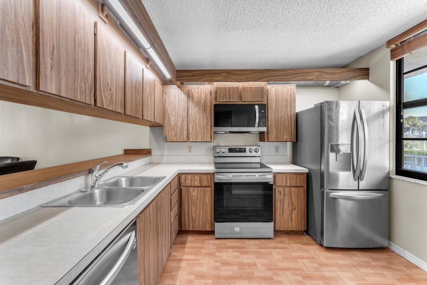 Welcome home to 3540 Whitehall Dr #203 in the heart of West Palm Beach! This bright and inviting 2-bedroom, 2-bath condo has been lovingly maintained and offers comfortable living in the sought-after gated community of Whitehall. The open layout provides a spacious feel, and the large windows fill the home with natural light while showcasing a beautiful water view.

Inside, you'll find generously sized bedrooms, ample storage, and an in-unit laundry room with bonus space that can double as a small office or hobby area. While the condo hasn't been updated, it's in excellent condition and move-in ready.

Resort-style amenities include a pool, clubhouse, and walking paths-all just minutes from Palm Beach Outlets, I-95, downtown West Palm Beach and Palm Beach International Airport.