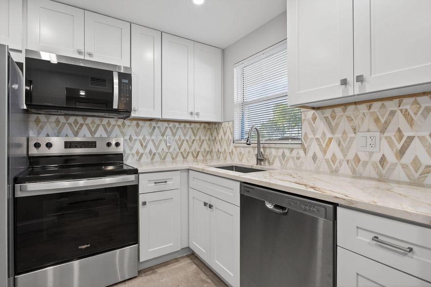 Renovated ground-floor garden residence with pool views and a private screened-in patio.
Move-in-ready home features a completely updated interior, including new kitchen cabinetry with elegant quartz countertops, brand-new appliances, new ceramic tile flooring throughout, modern lighting, and stylish ceiling fans.
The spacious primary suite offers a walk-in closet and a fully upgraded bath with double vanities and a walk-in shower.
Additional recent improvements include a new HVAC system and water heater, providing comfort and peace of mind.
The condo fee covers cable, exterior insurance, and water for added convenience. Community amenities include a pool, sauna, clubhouse, cabana, picnic area, and on-site laundry facility.