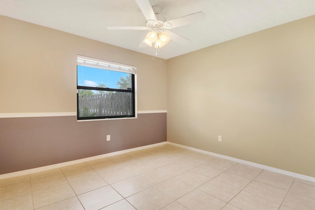 Photo of 1101 SW Sudder Avenue, Port Saint Lucie, FL 34953 (MLS # R10964731)