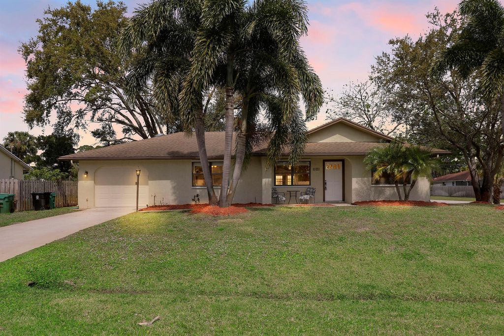 Photo of 1101 SW Sudder Avenue, Port Saint Lucie, FL 34953 (MLS # R10964731)