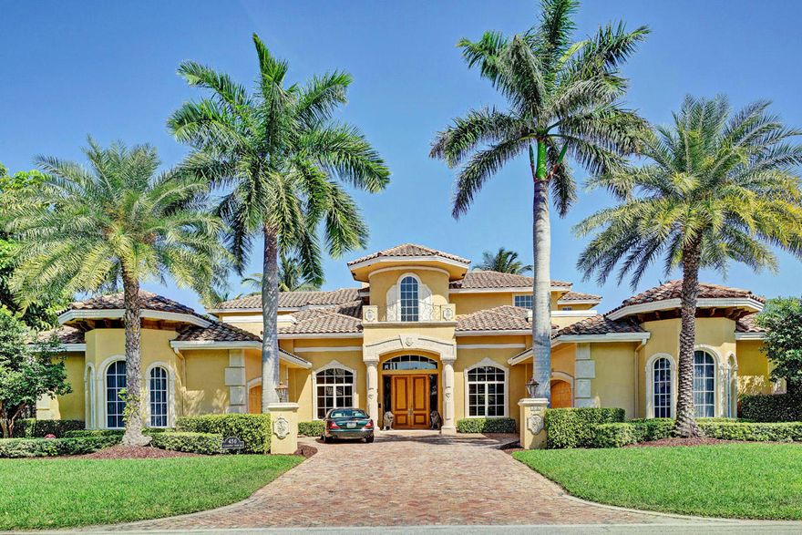 Intracoastal home on 104' of waterfront in Royal Palm Yacht & Country Club with 6 bedrooms, 8 and 1/2 bathrooms and a 4 car garage. All bedrooms on the 2nd floor have views of the Intracoastal Waterway with French doors leading out to a balcony, en suite bathrooms, and walk-in closets. Large master suite on the 1st floor features separate his and her bathrooms, his and her closets, and an exercise room with French doors leading out to the pool/patio area. Marble flooring throughout all main living areas, volume ceilings, formal living and dining rooms, private den/library, family room and breakfast area off the gourmet kitchen with views of the waterway, elevator, central vac and 4-zone air conditioning.