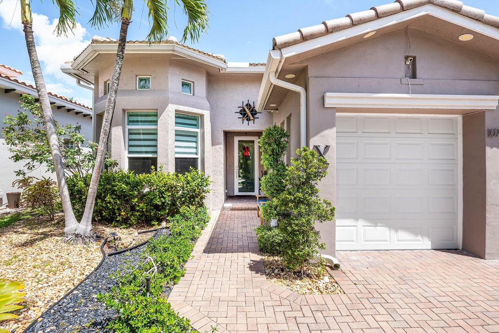 Photo of 10715 NW 83rd Court, Parkland, FL 33076 (MLS # B26016587)