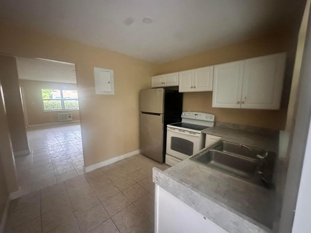 Photo of 5644 NW 14th Court, Lauderhill, FL 33313 (MLS # B26058312)