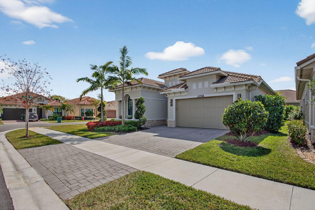Photo of 11746 Vivar Run, Parkland, FL 33076 (MLS # R11162990)