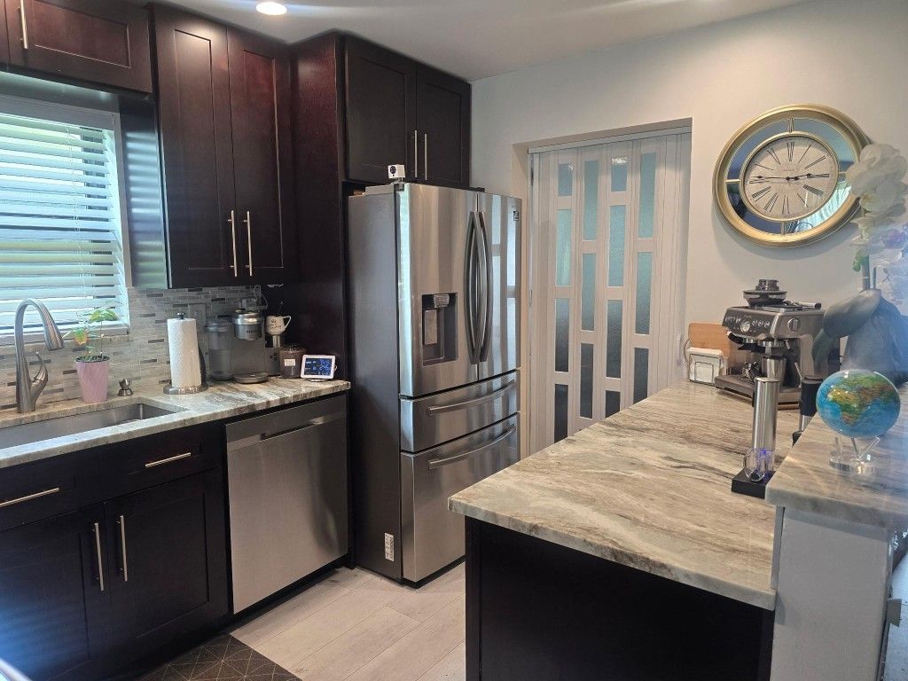 Photo of 2098 SW 17th Drive, Deerfield Beach, FL 33442 (MLS # F10524201)