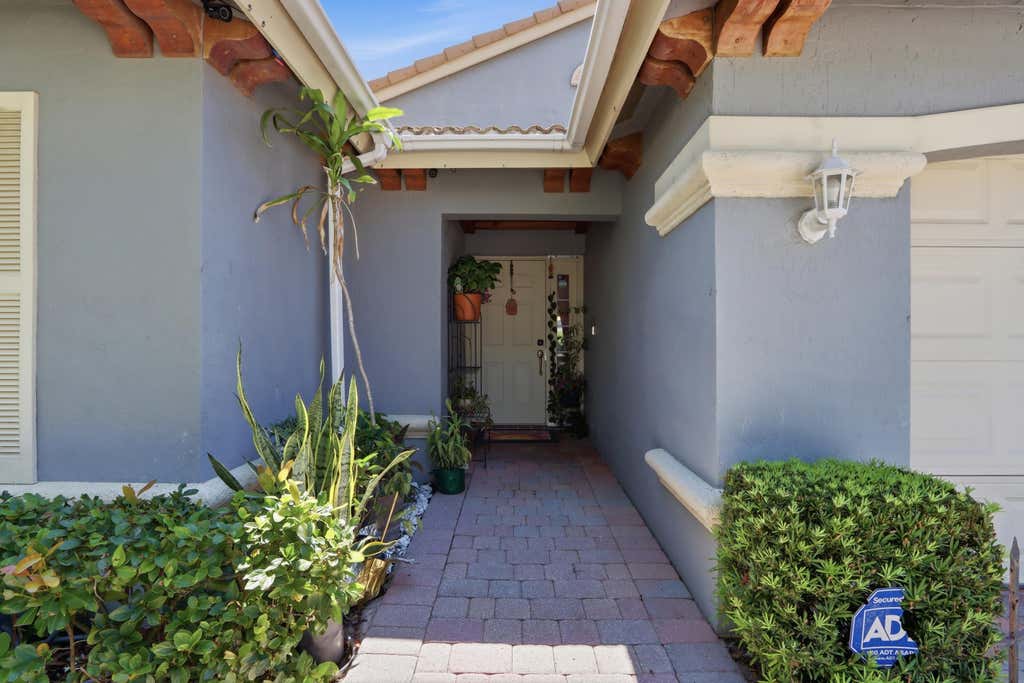 Photo of 4342 Onega Circle, West Palm Beach, FL 33409 (MLS # B26039025)