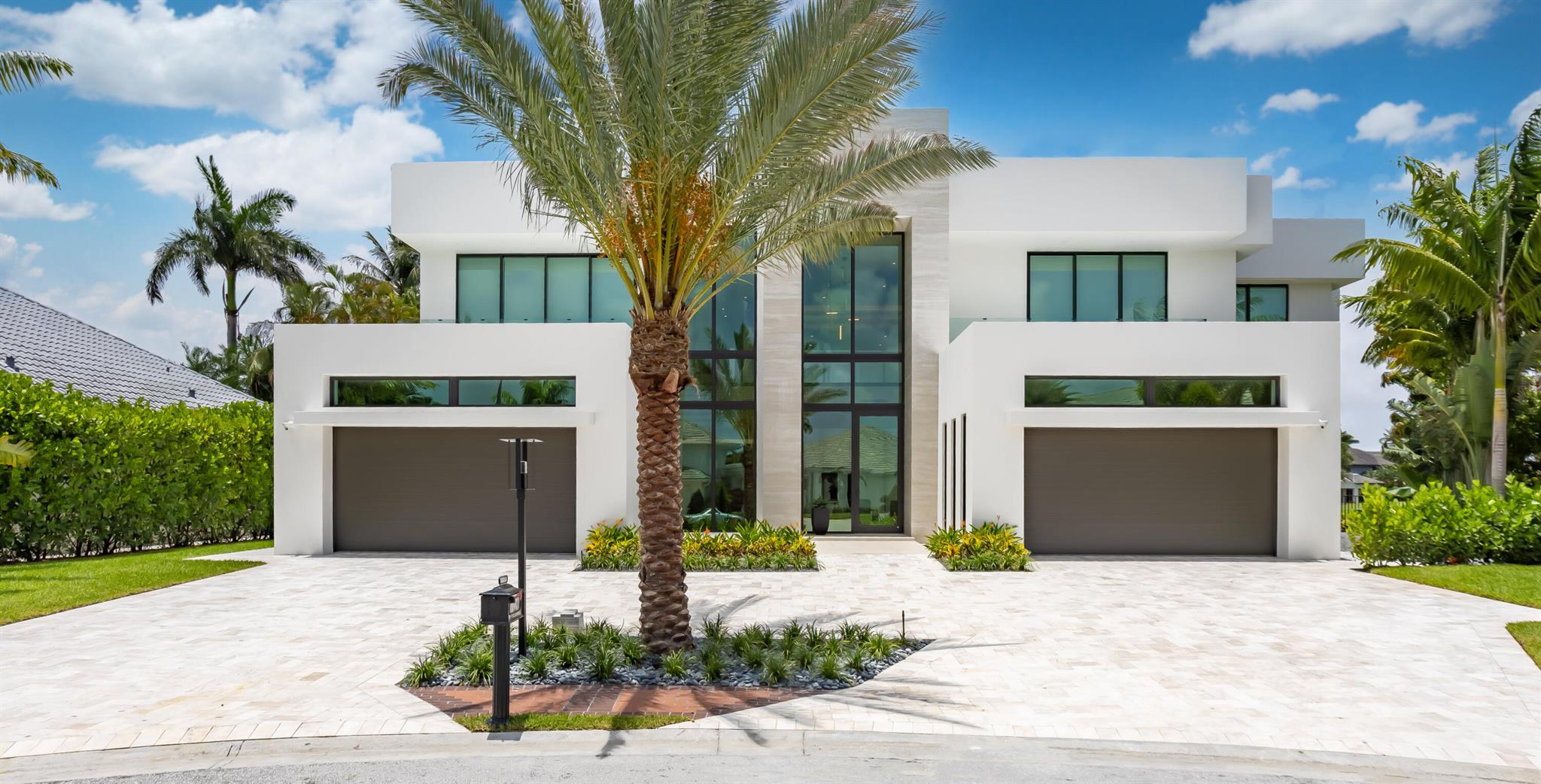 COMING SOON! Reich Construction Group continues to offer an elevated level of excellence in design and craftmanship in this new fully furnished contemporary offering, with interiors by Michael Gray. A front glass entry opens to a dramatic two story great room with exceptional multiple lake and golf course vistas. A primary bedroom suite, kitchen with rear patio facing dining/dinette area, office, club/media room, expansive covered patio entertainment area, elevator and dual two car garages all reside on the first floor. A 'showpiece' staircase ascends to four en-suite bedrooms, a lounge, game and wellness/fitness areas. More exciting details are coming soon. See More...