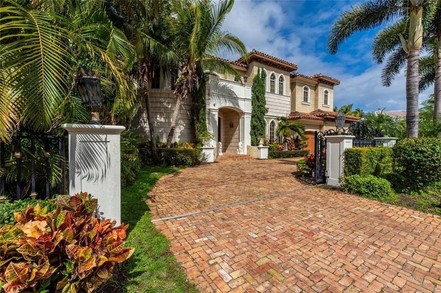 This exquisitely and professionally decorated waterfront home features 6 bedrooms,(2 master suites) formal dining room, large working office and state of the art movie theater with stadium seating. The gourmet kitchen with Butler’s pantry contains top of the line appliances. Home is complete with impact windows and doors, 3 car garage and a gated entry. Lutron lightning system and security cameras. An elevator eases access to the upper level. A magnificent pool and spa, outdoor kitchen area with concrete dock complements the outdoors. Located in a prestigious Lighthouse Point on 1/4 acre professionally landscaped lot. Just minutes from Hillsboro Inlet, with spectacular view of the canal. This is your ideal home for entertaining. By appointment only. Agent has personal interest.