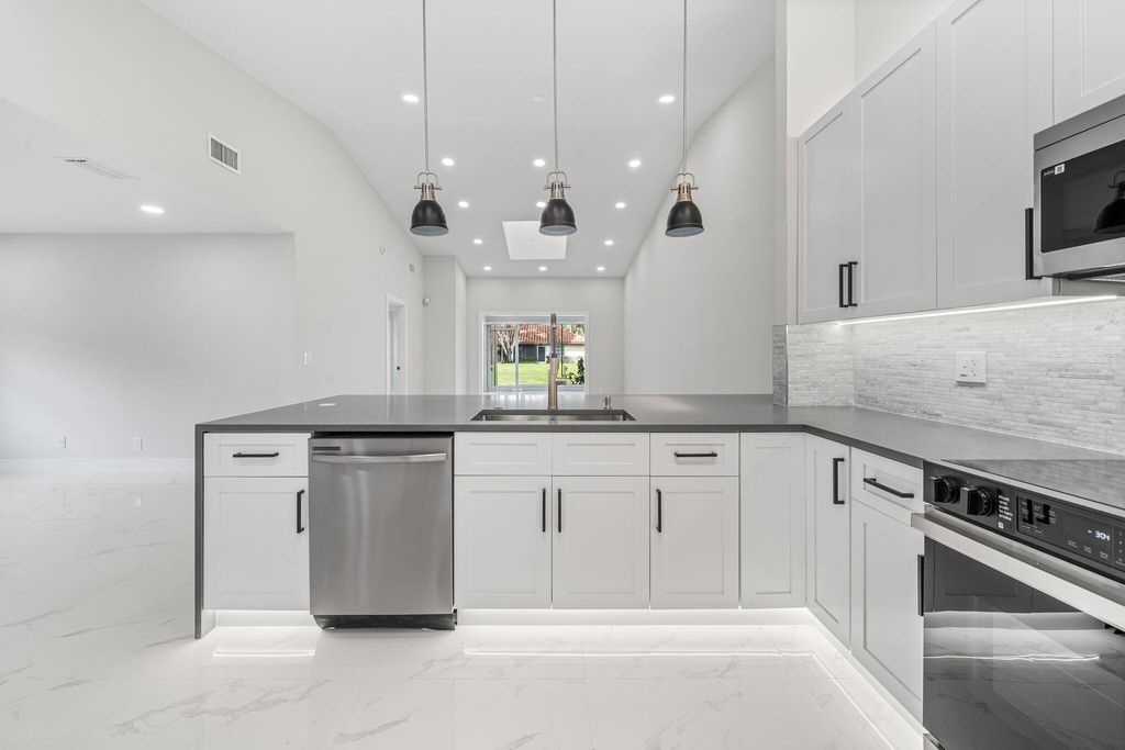 Photo of 6426 Pointe Pleasant Circle, Delray Beach, FL 33484 (MLS # R11160959)