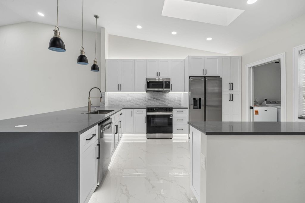 Photo of 6426 Pointe Pleasant Circle, Delray Beach, FL 33484 (MLS # R11160959)