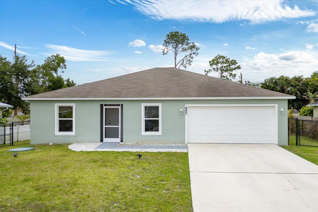 Photo of 482 NW Fairfax Avenue, Port Saint Lucie, FL 34983 (MLS # R11090194)