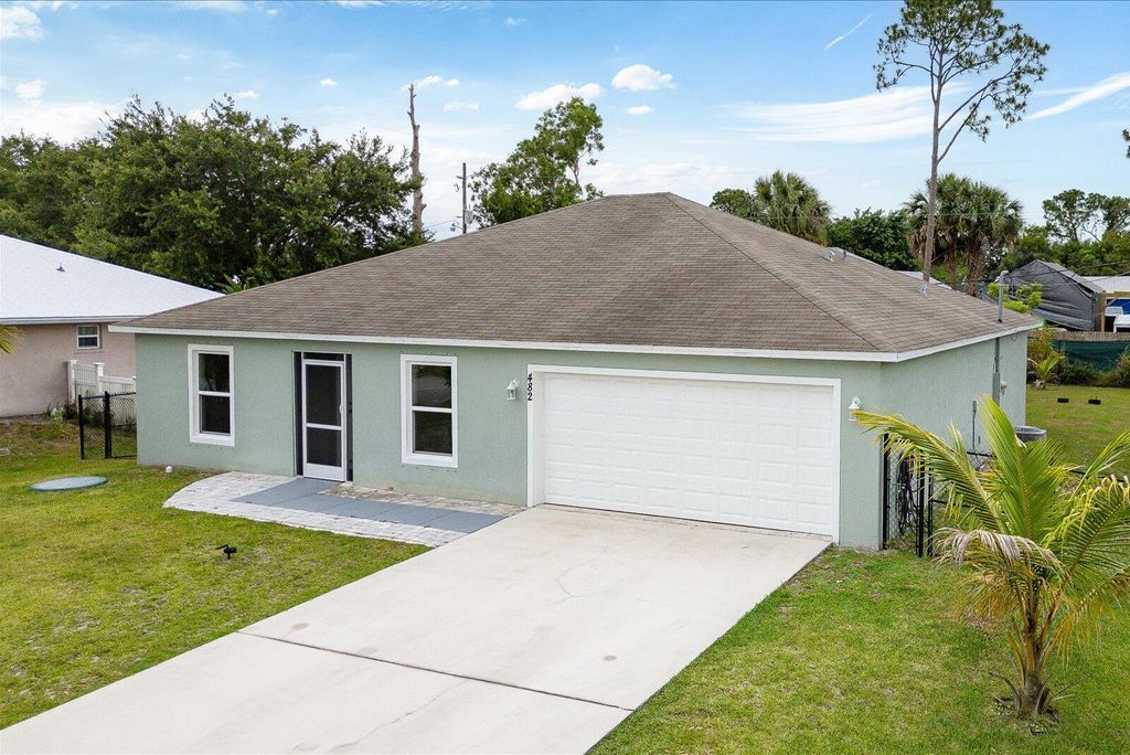 Photo of 482 NW Fairfax Avenue, Port Saint Lucie, FL 34983 (MLS # R11090194)