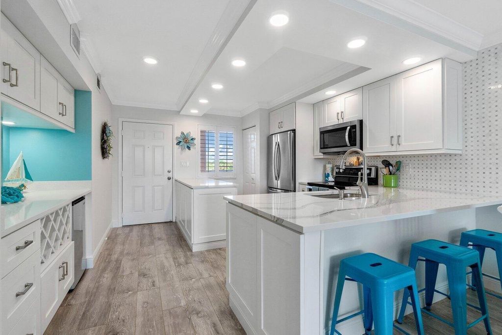 Photo of 353 S Us Highway 1 #A304, Jupiter, FL 33477 (MLS # R10967974)