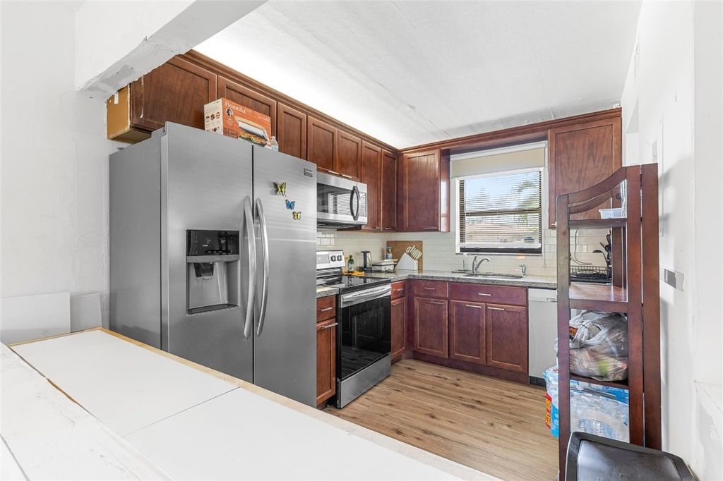 Photo of 21902 Lake Forest Circle #101, Boca Raton, FL 33433 (MLS # F10541220)
