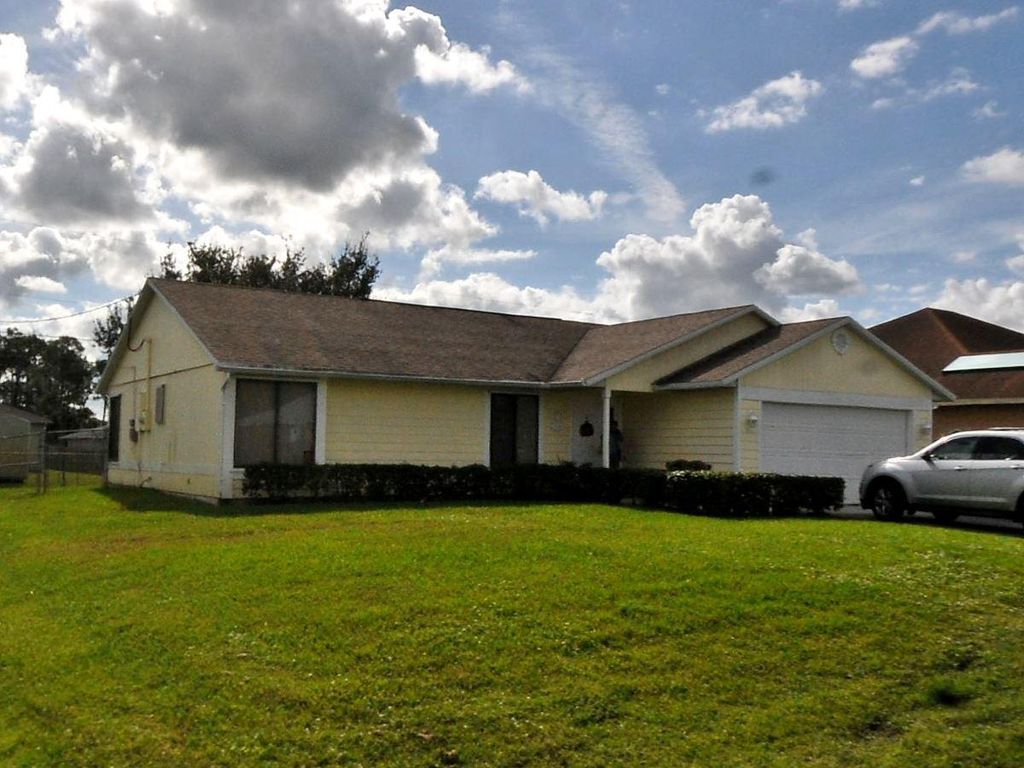 Photo of 1444 SW Dimperio Avenue Ave, Port Saint Lucie, FL 34953 (MLS # R10807920)