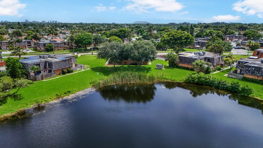 Beautiful 2 bedrooms 2baths corner unit with a peaceful lake view and well-maintained common grassy area, private courtyard patio with new fence to enjoy your BBQ . Excellent condition, tile flooring through out (wood look style), freshly painted. Accordion shutters. Family-friendly neighborhood with community park and picnic area. Perfect location close to shopping centers, restaurants, highways beaches and airports.