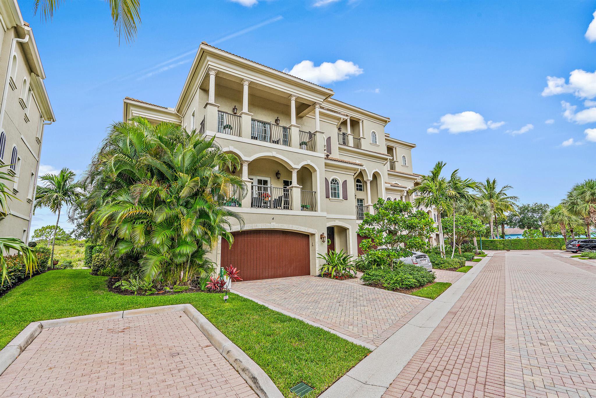 Wow! This beautiful seasonal rental is situated on Jupiter Riverwalk so you can walk or bike to the beach, Jupiter Yacht Club, Harbourside restaurants and shopping. This multi-level townhome is an end unit w/ lots of natural light w/ 3 bedrooms, private elevator, 3.1 baths & private elevator. Each bedroom has its own covered balcony or patio, plus a rooftop terrace overlooking the Intracoastal and Jupiter Ridge Natural Area. Amazing sunsets! First floor VIP suite has a full bath, den area and Murphy bed was recently replaced with a full bed. Enjoy over 1,100 square feet of stylish outdoor living spaces and 2,900 square feet of air-conditioned space. Kitchen is a chef's dream, top-of-the-line appliances, gas stove, designer furniture, impact glass, 2 car garage and close (See Supplement)