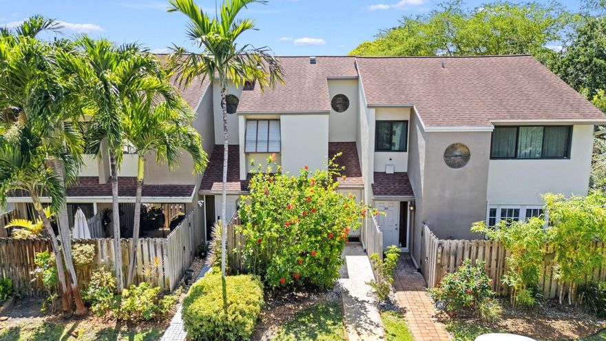 FEE SIMPLE 2-bed/1.5-bath townhouse located in the heart of Downtown Fort Lauderdale! Buy with an FHA, VA, or 3% down conventional loan! Ideally situated in the quiet center of the community, this interior unit backs up to green space, the clubhouse & heated pool. FEATURES INCLUDE: PVC sewer pipes, brand new vinyl flooring upstairs, tile downstairs, fresh interior paint, updated kitchen and baths, laundry room, & private front and back patios. City View is a gated 18-acre community bordering Flagler Village and the Brightline station, just a short walk to The Riverwalk, Las Olas Blvd & Himmarshee. Enjoy tennis courts, pet-friendly living, and a neighborhood surrounded by exciting new development. HOA has reserves & a low monthly fee covering the roof, ext insurance, fences & landscaping!