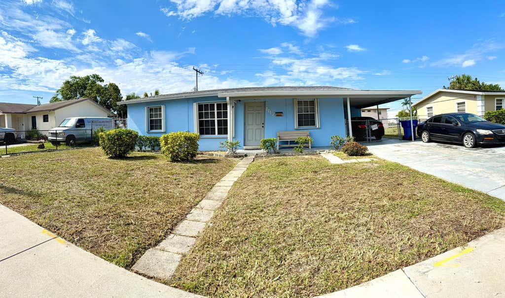 Photo of 1117 W 23rd Street, Riviera Beach, FL 33404 (MLS # B26040924)