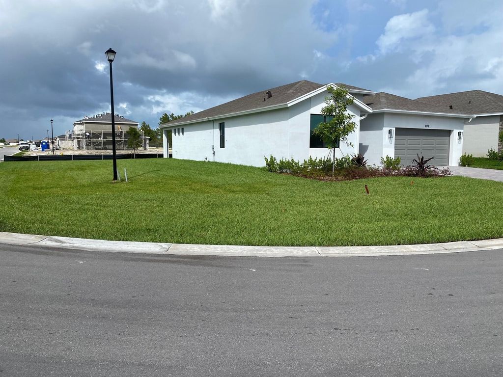 Photo of 1879 NE Ocean Dunes Drive, Jensen Beach, FL 34957 (MLS # R10907266)