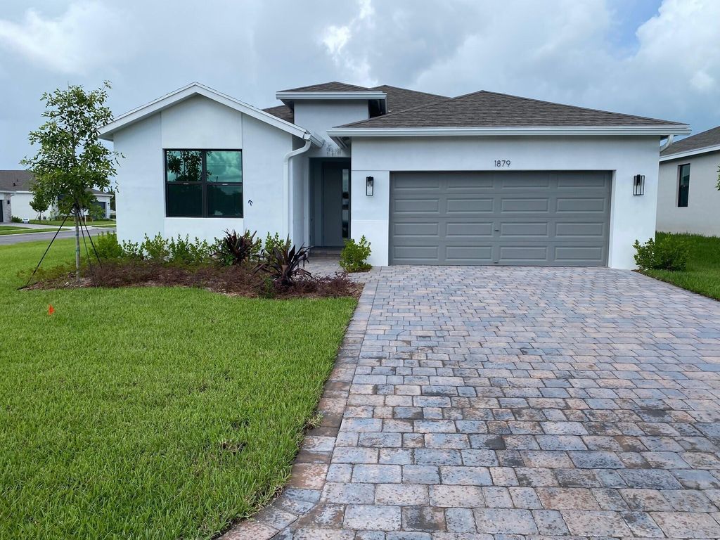 Photo of 1879 NE Ocean Dunes Drive, Jensen Beach, FL 34957 (MLS # R10907266)