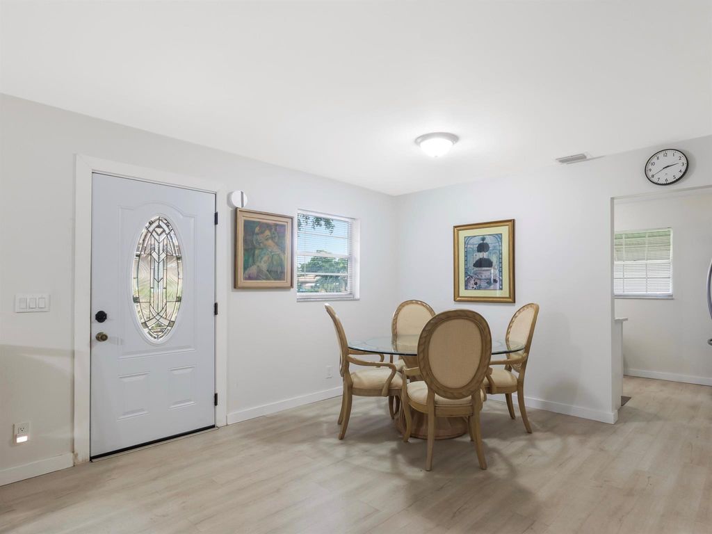 Photo of 725 Whippoorwill Lane, Delray Beach, FL 33445 (MLS # R11119411)